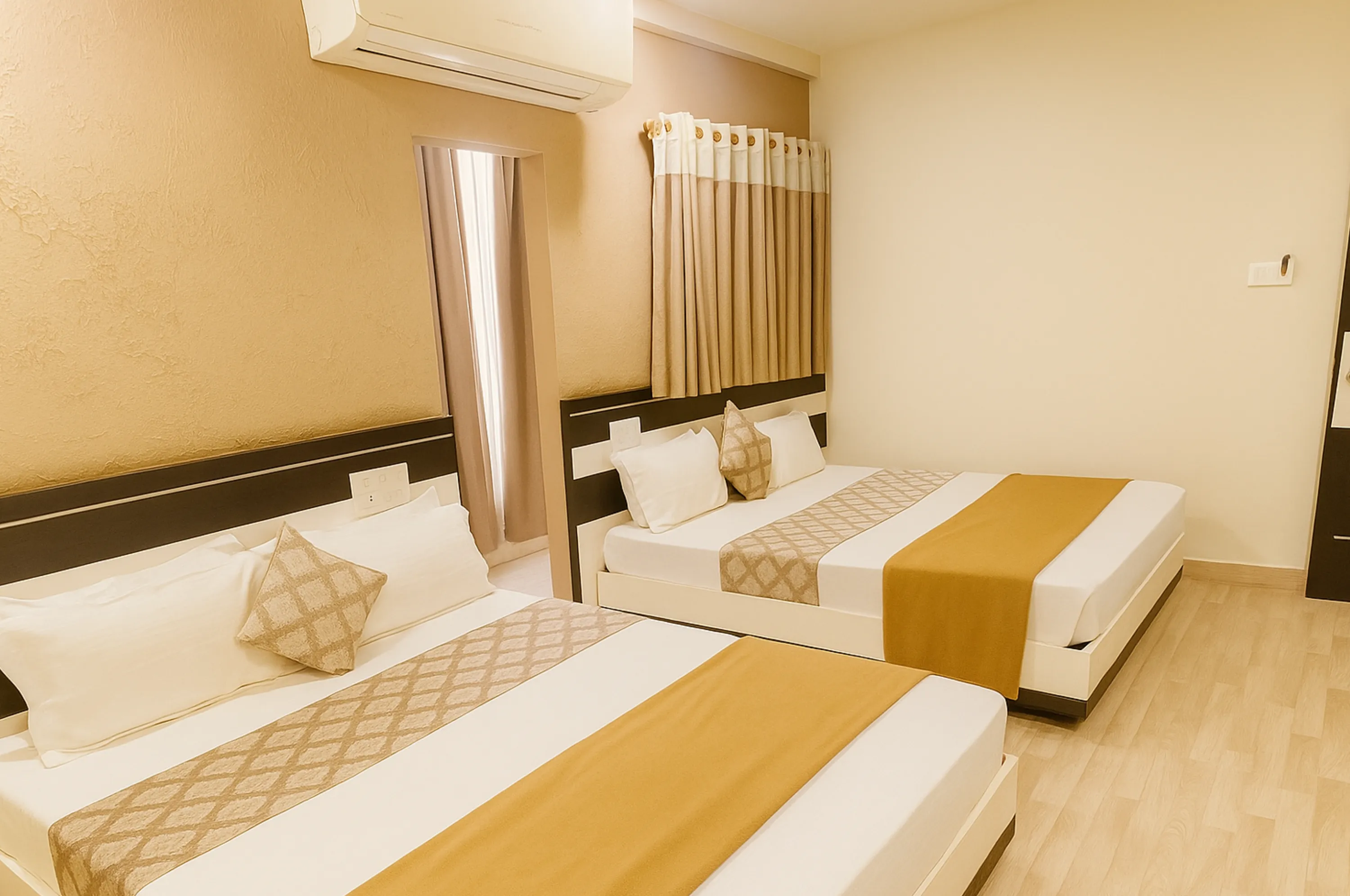 Four bed AC family stay accommodation near Somnath Temple at Hotel Vrajbhoomi.