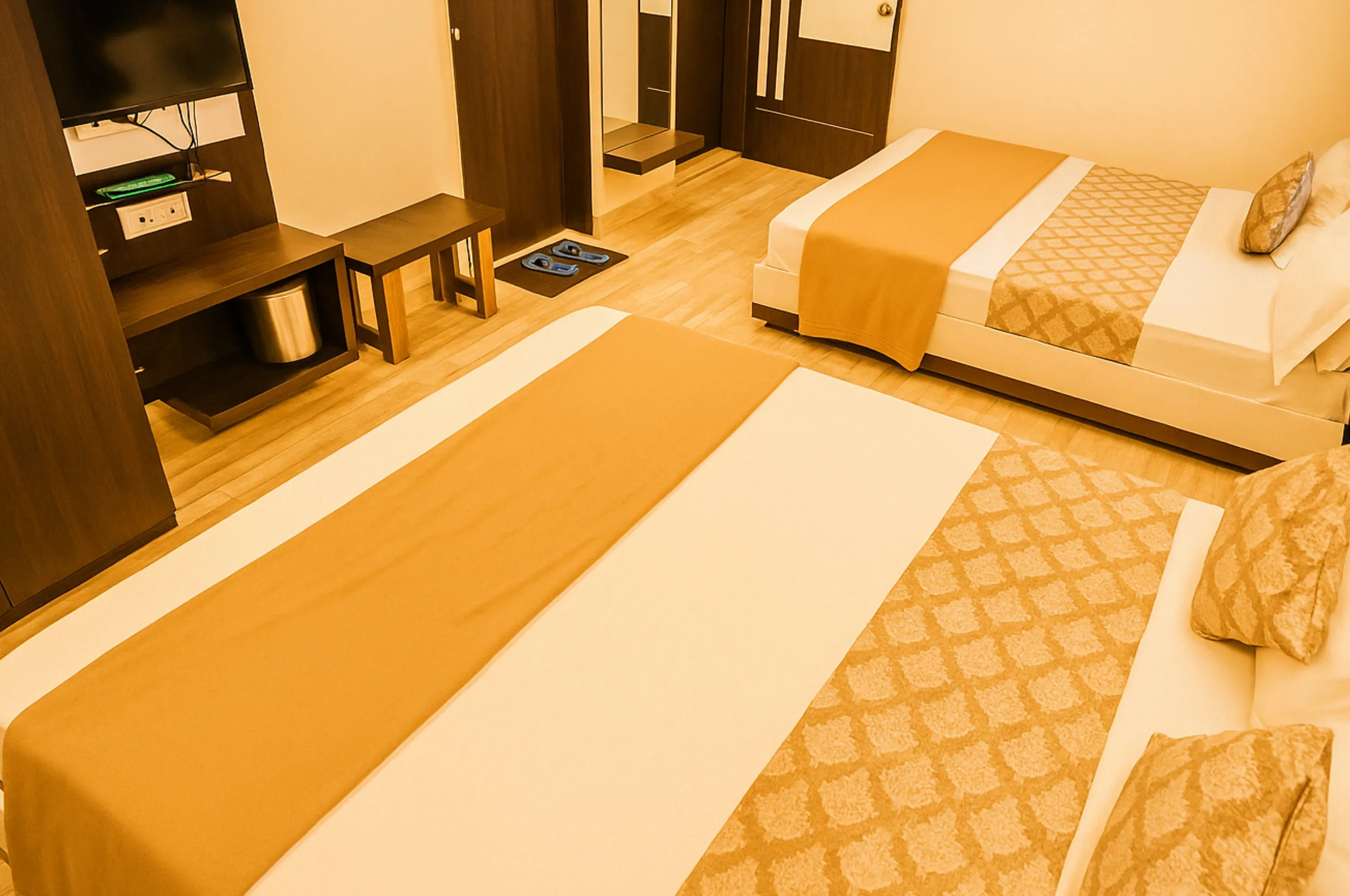 Large family four bed non AC room in Somnath at Hotel Vrajbhoomi with clean environment.