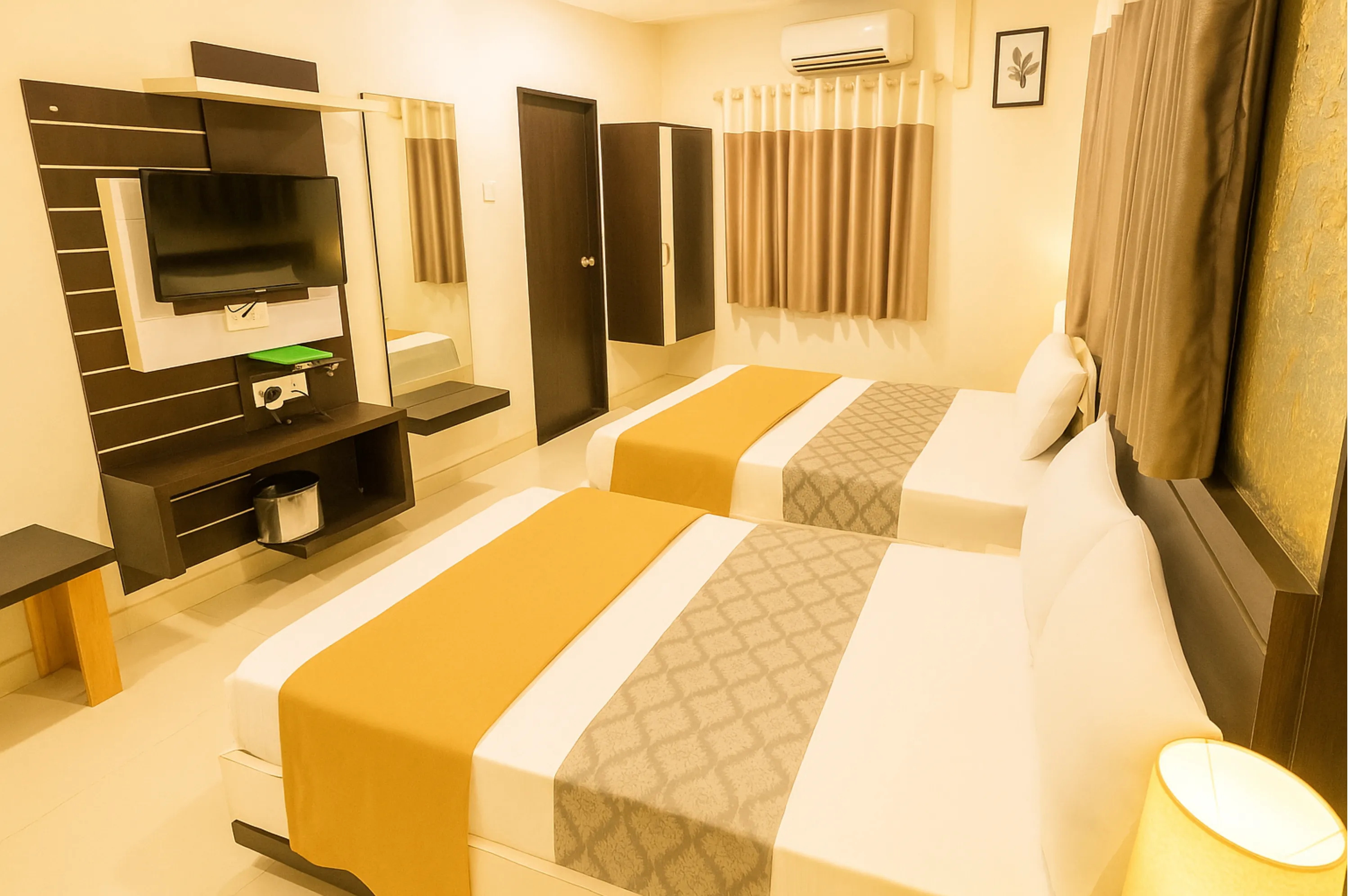Budget triple bed AC room at Hotel Vrajbhoomi Somnath