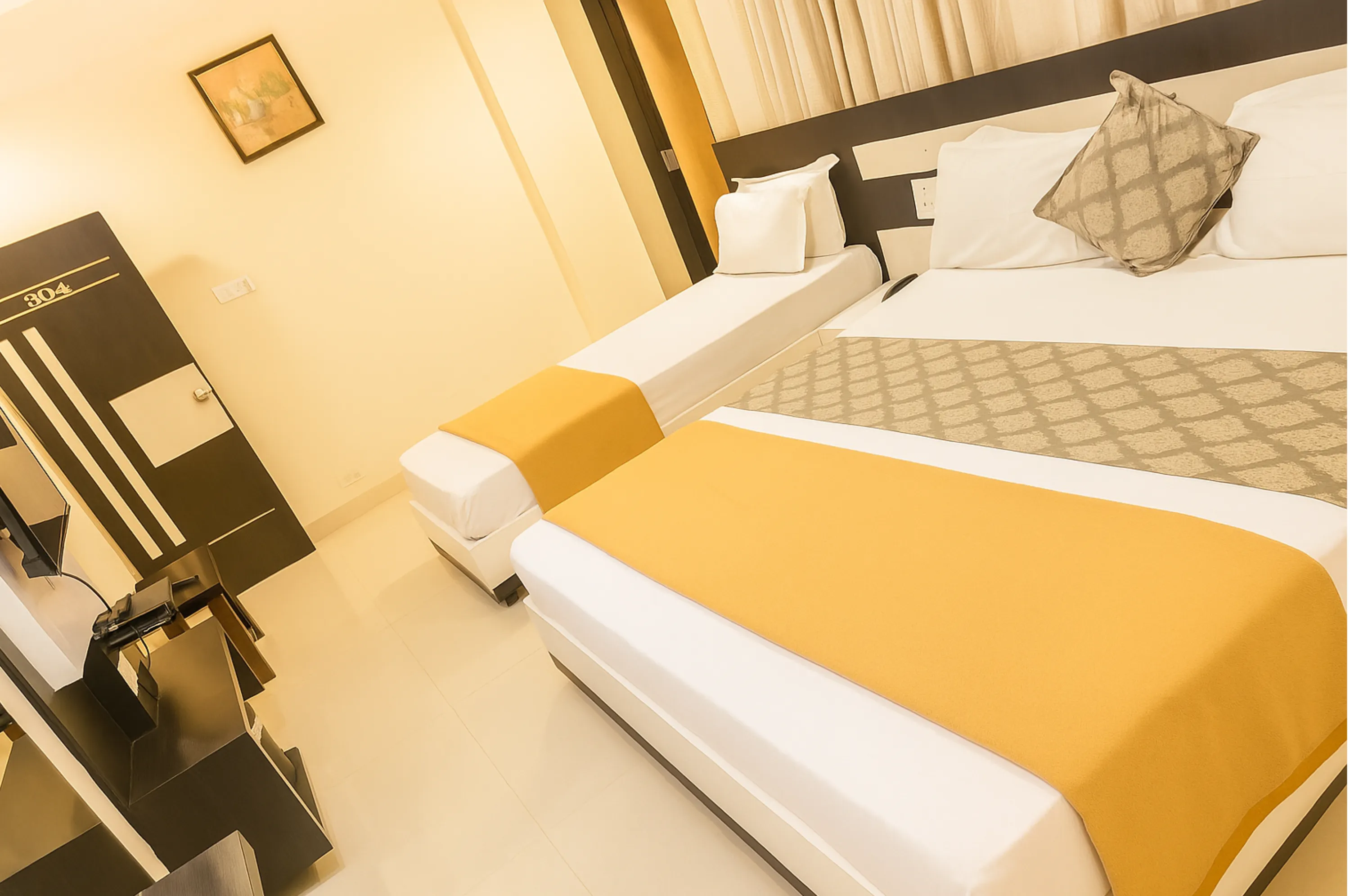 Spacious triple bed room at Hotel Vrajbhoomi Somnath for families