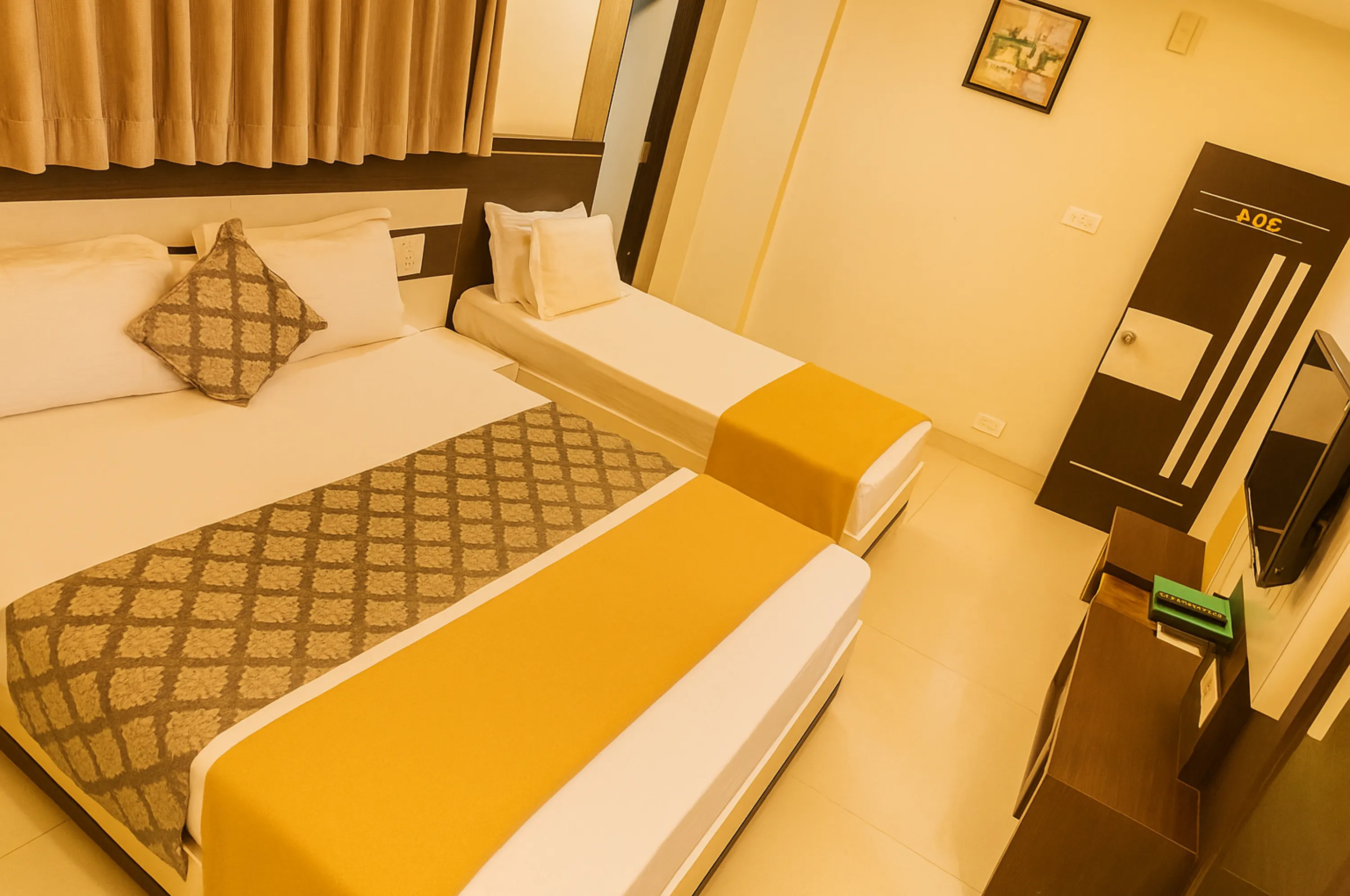 Triple bed non-AC room near Somnath Temple for pilgrims